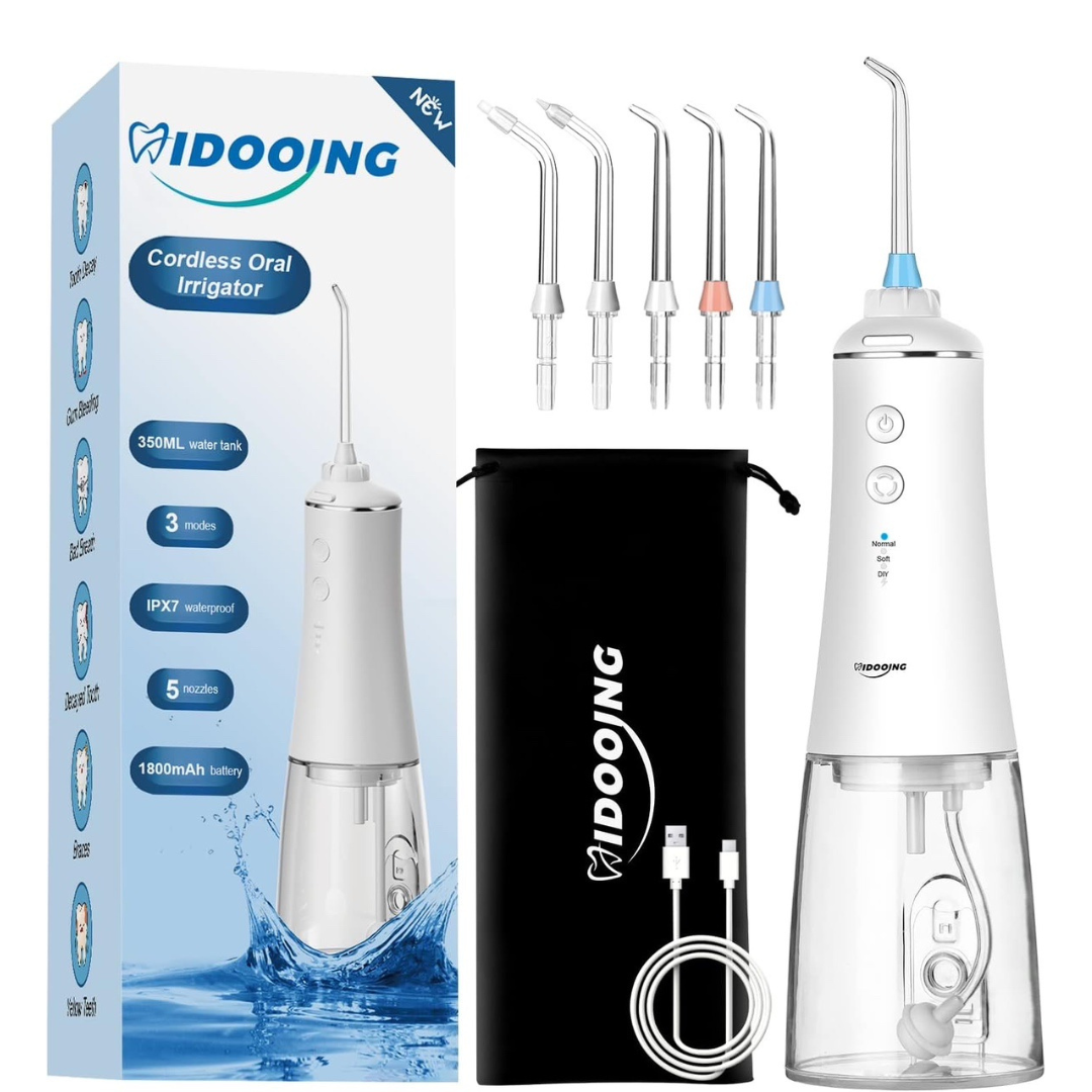 Cordless Water Flosser kit with multiple nozzle tips, USB cable, pouch, and packaging box. The device features a clear water tank and sleek design.