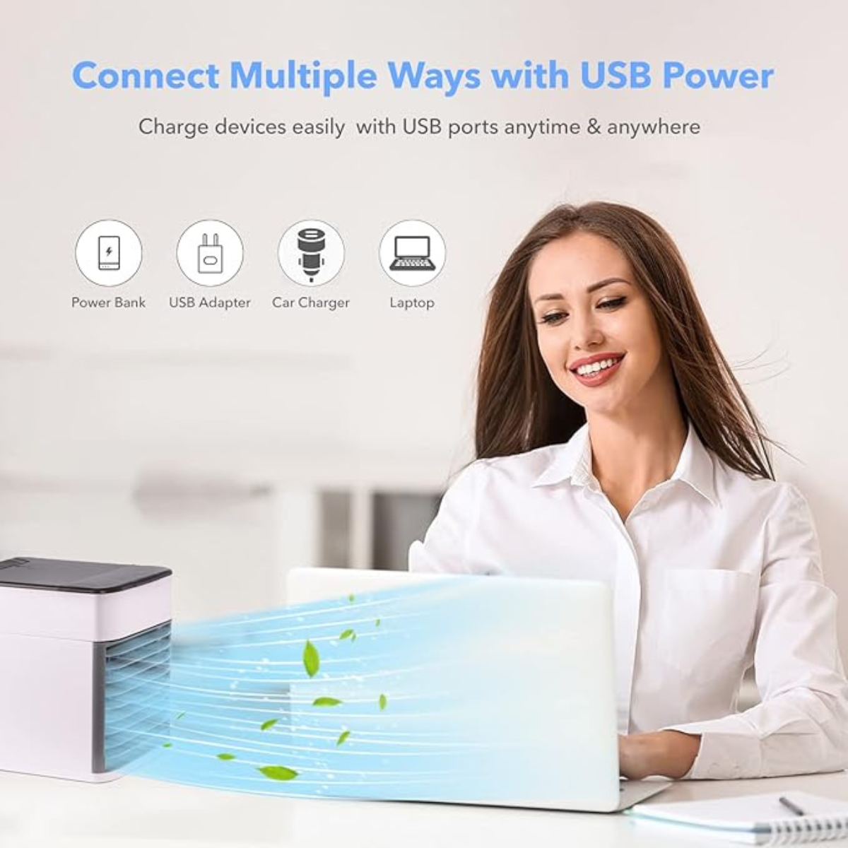 Portable USB air cooler connected to a laptop using USB power. Supports multiple power sources like power banks and adapters.