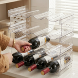 4-tier stackable wine bottle holder with clear design, storing bottles on countertop