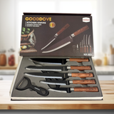 Gooddove kitchen knives set with wooden handles in a box on a kitchen counter.