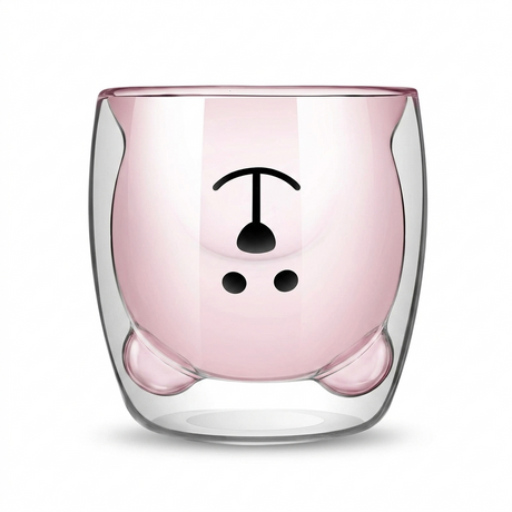 Transparent double wall glass cup with a light pink inner layer and cartoon face design. Rounded shape with small feet for a playful look.