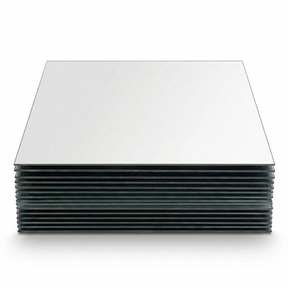 Stack of frameless mirror tile set squares neatly arranged. 8-inch mirror tiles with a sleek reflective surface.