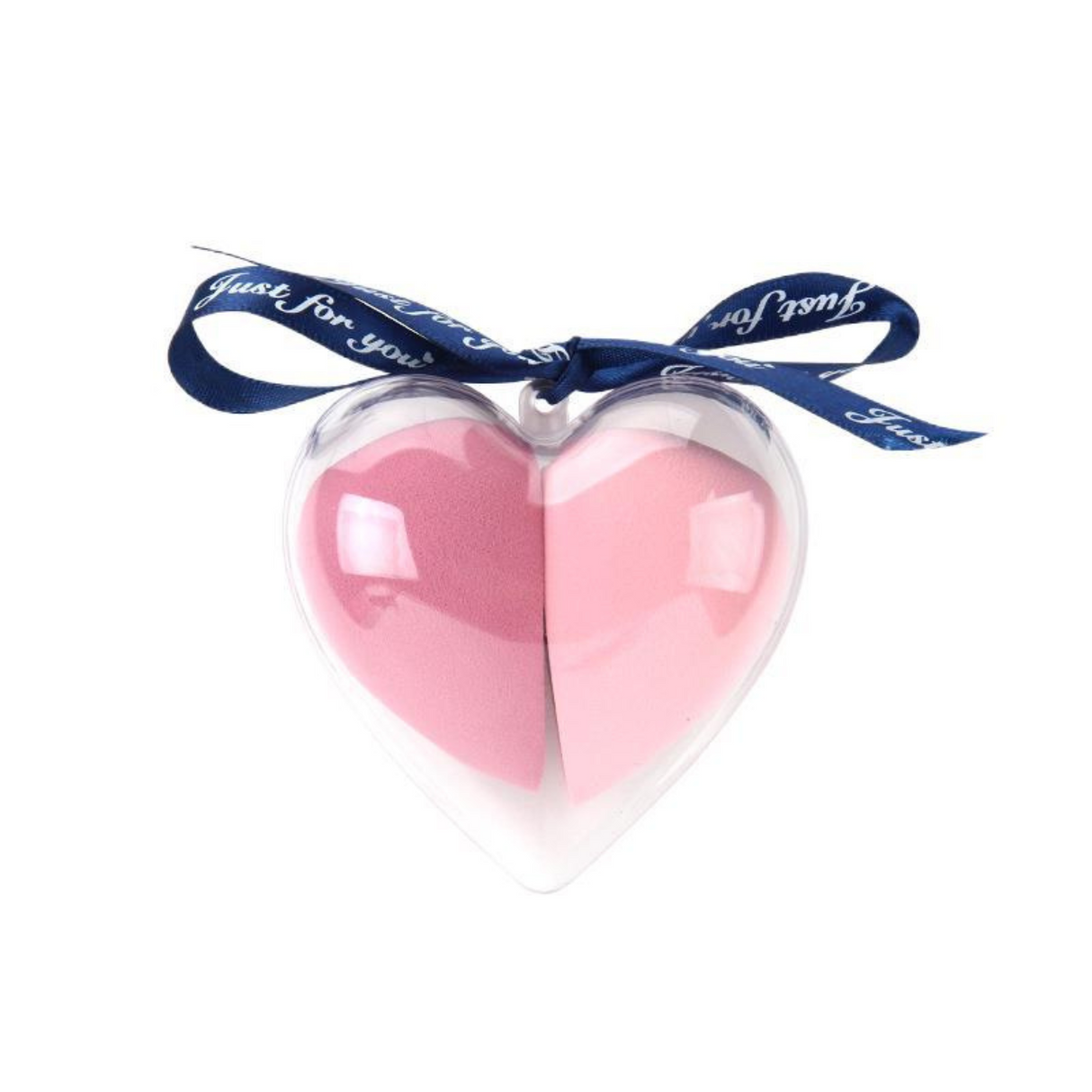 Heart-shaped case containing dual pink makeup sponge puff ideal for blending cosmetics.