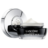 Lancome Advanced Genifique Eye Cream jar with silver lid placed beside it. The product shows a smooth cream texture inside the container.