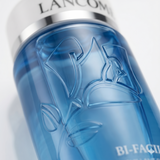 Close-up of Lancome Bi-Facil remover bottle showing embossed logo detail