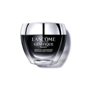 Lancome Genifique Night Repair Cream jar with silver lid on a clean background. The product packaging appears sleek and premium.