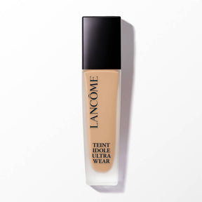 Lancome Teint Idole Ultra Wear Foundation bottle centered on a plain background. The product showcases its natural-looking liquid formula.