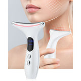 LED neck massager being used on the jawline and neck area. Device designed for lifting and firming skincare treatment.