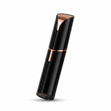 Black portable electric facial hair remover shown at an angle. Compact and stylish with a smooth glossy finish.