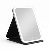 Portable LED makeup mirror angled view with foldable stand base