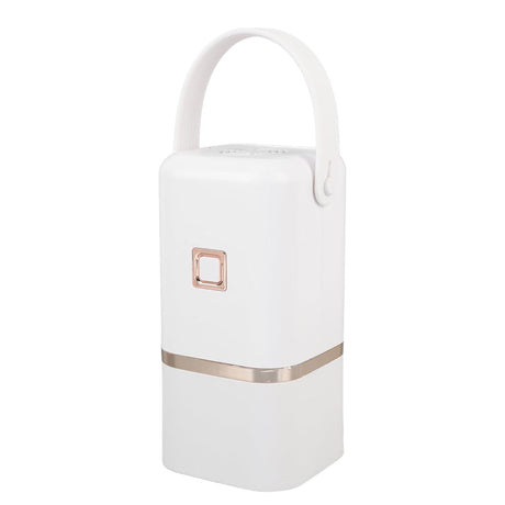 A sleek white portable mini clothes dryer featuring a rose gold trim and a convenient carrying handle for travel use.