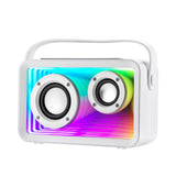 Portable Bluetooth speaker with RGB light panel and dual front drivers in white. Compact speaker with carry handle for easy use.