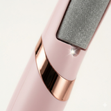 Close-up of electric callus remover grinding head with fine exfoliating surface