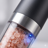Close-up of electric grinder showing coarse pink salt and LED light