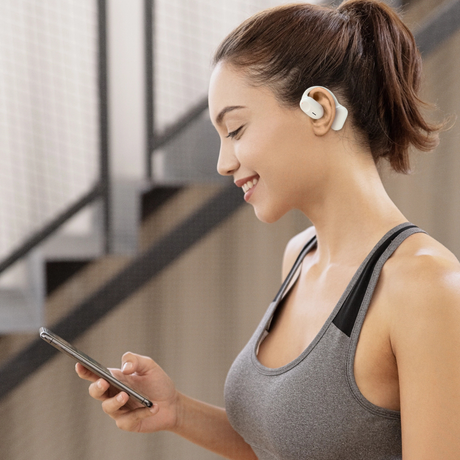 Wesdar TWS516 wireless earbuds worn by a woman during workout. Sport earbuds provide secure fit and hands-free use.