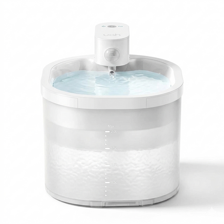 A 2L wireless cat water fountain with a sleek white design and clear water level markings. The motion-activated dispenser is shown in a clean, minimalist studio setting.