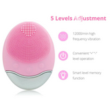 Wireless silicone facial cleansing brush showing 5 adjustable vibration levels. Buttons for easy control and memory function are visible.